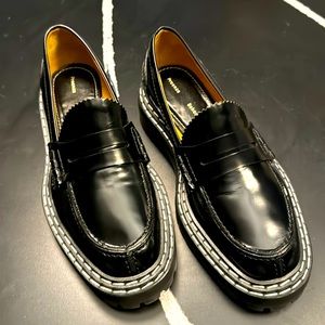 Proenza Schouler Sz-38 Black Lug Sole Loafers with white double layer stitching.